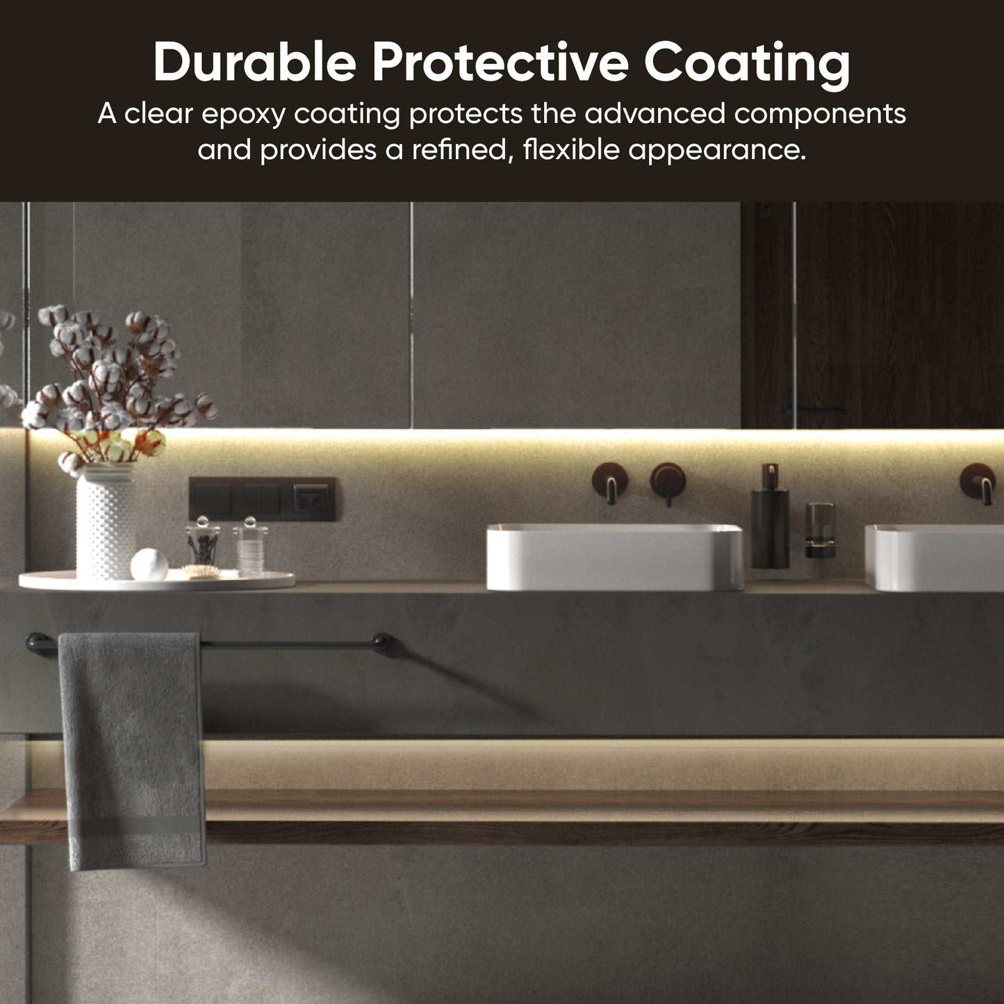 Warm white lights softly glowing over bathroom vanity. White text overlay that says "Clear epoxy coating protects from accidental damage."