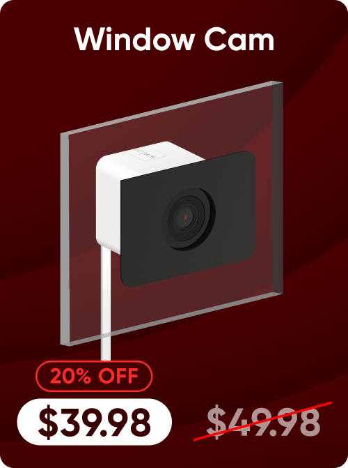 Window camera with a red discount label on a dark red background