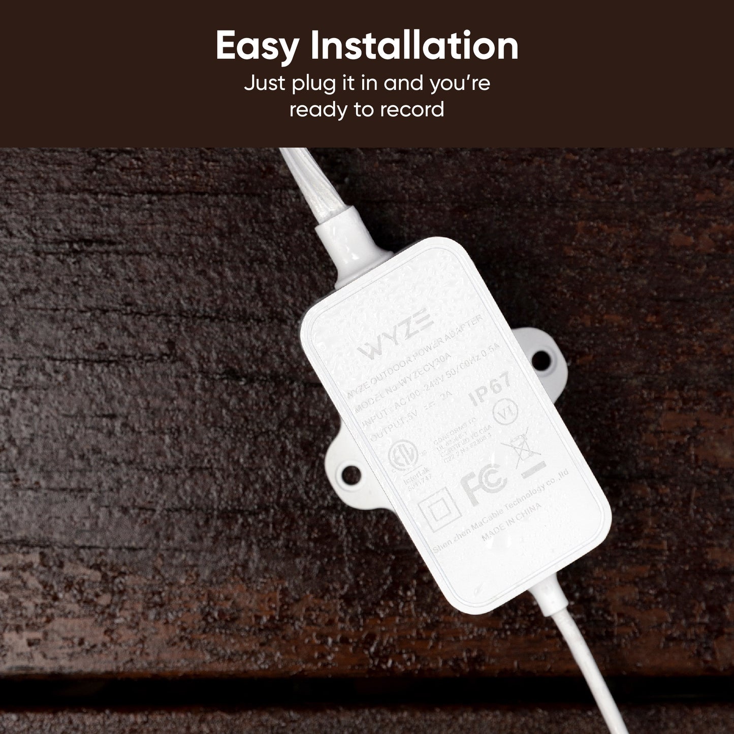 Backside of the power adapter unit with voltage and weatherproof information